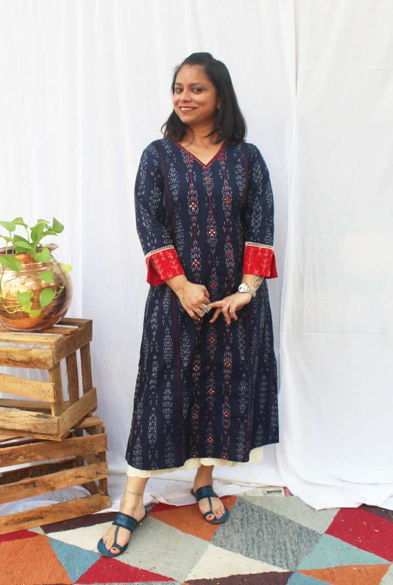 A line kurti with machine embroidery detailing