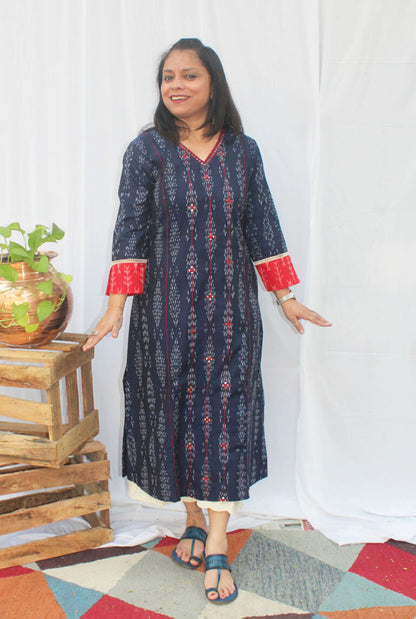 A line kurti with machine embroidery detailing