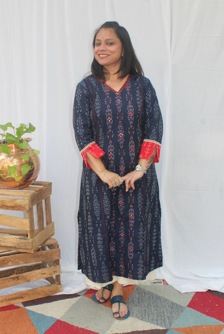 A line kurti with machine embroidery detailing