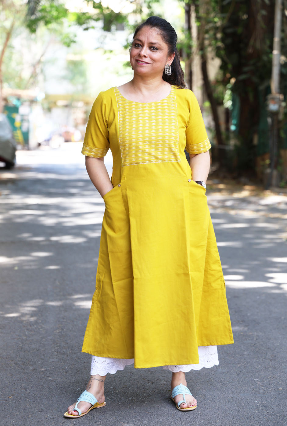 A Line Handloom Yellow Cotton Kurti With Ikat Yoke & Pockets