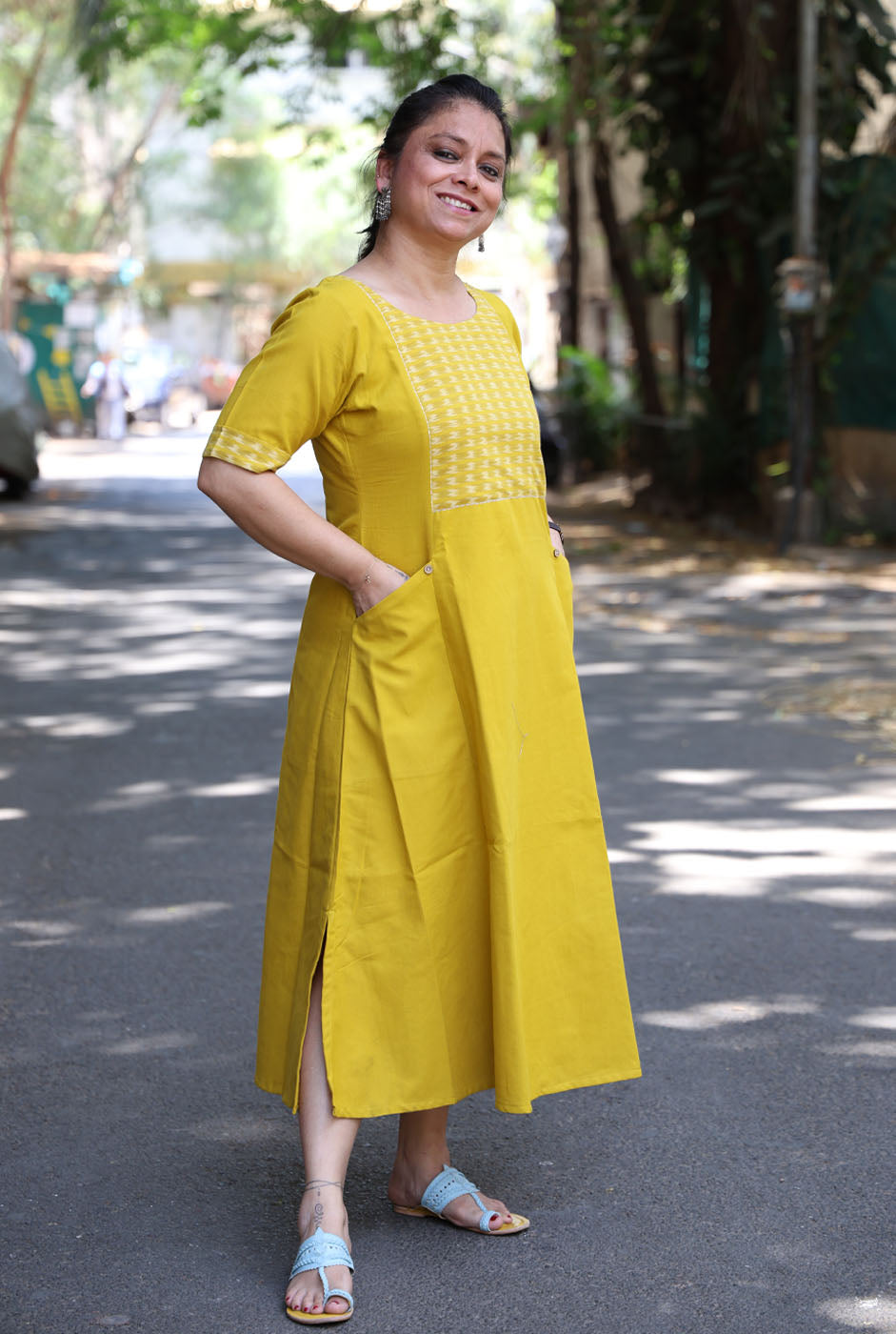 A Line Handloom Yellow Cotton Kurti With Ikat Yoke & Pockets