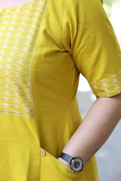 A Line Handloom Yellow Cotton Kurti With Ikat Yoke & Pockets