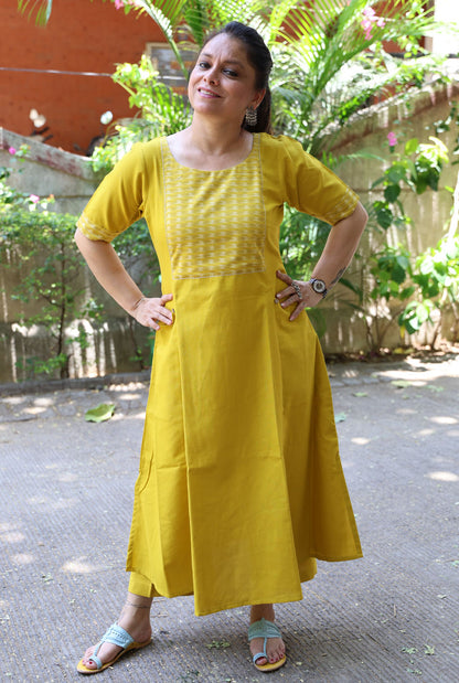A Line Handloom Yellow Cotton Kurti With Ikat Yoke & Pockets