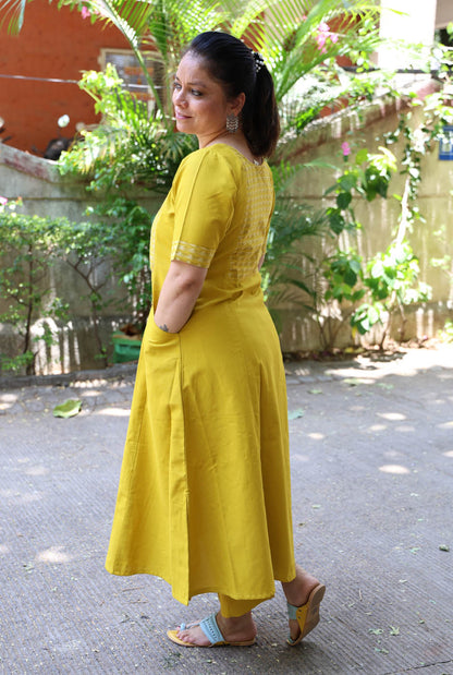 A Line Handloom Yellow Cotton Kurti With Ikat Yoke & Pockets