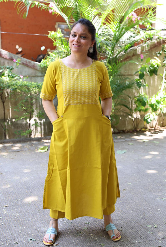 A Line Handloom Yellow Cotton Kurti With Ikat Yoke & Pockets